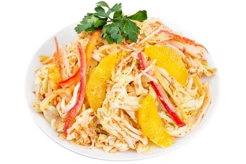 High Angle View of a Nutritious Vegetable Salad with orange Slices, Served on Stock Photos