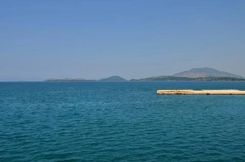 High angle view  oh a  quay on Ionian sea water in  Greece near Corfu island Stock Photos
