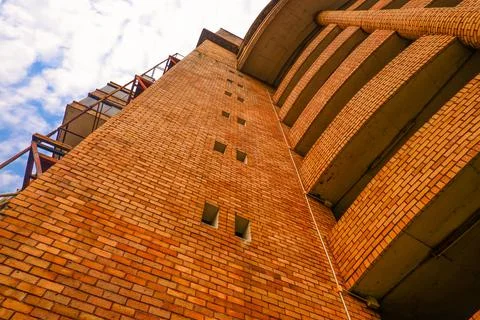 High angle view of old retro tall building brick wall background. Stock Photos
