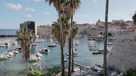 High angle view of Old Town and harbour port In Dubrovnik, Croatia, 4k Video stock 274457782