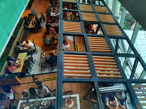 High angle view of open cafe in the mall. Stock Photos