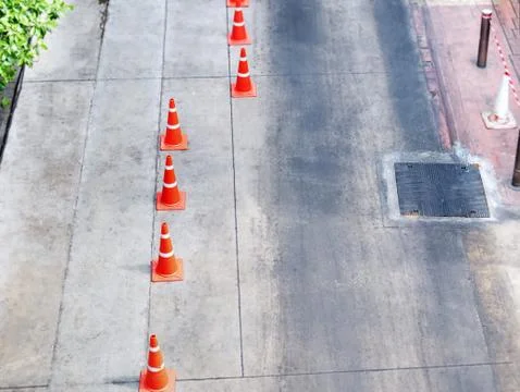 High Angle View of Orange Traffic Cones on Street Foto stock