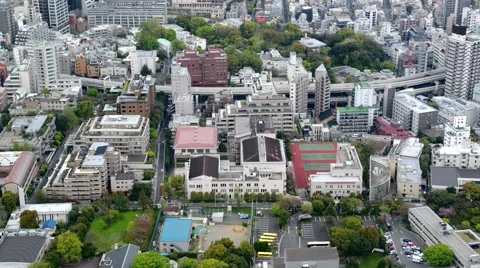 High angle view over city buildings and streets in Central Tokyo 스톡 동영상 40648863