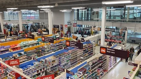 High angle view overlooking the aisles of a sainsburys supermarket Stock Footage 125629483