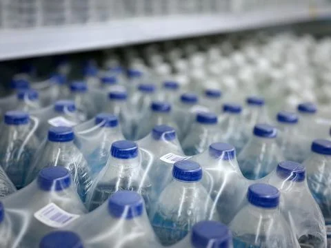 High Angle View of Packs of Bottled Drinking Water with Selective Focus Foto stock