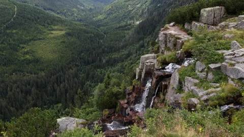 High angle view of Pancava Waterfall cascading down into the deep Elbe Vall.. Stock Footage 340457281