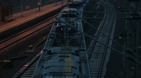 High angle view of a passenger train passing by Stock Footage 67676487