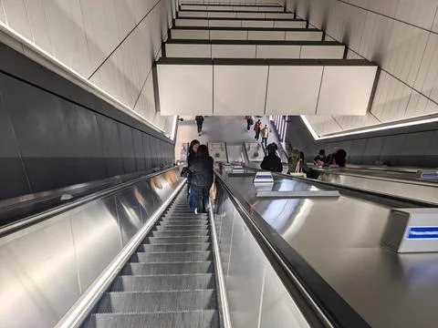 High angle view of passengers descending a modern escalator in Bond Street Stock Photos