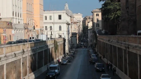 High angle view of pedestrians walking down lone roman road Stock Footage 36778196