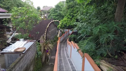 High Angle View, Penjor in the Garden on Narrow Street, Ubud, Bali, Indonesia Vidéo 254177271