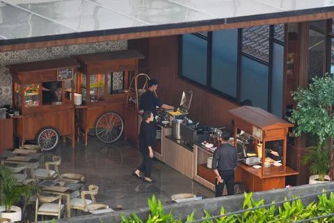 High angle view of people dining at an outdoor restaurant terrace. Stock Photos