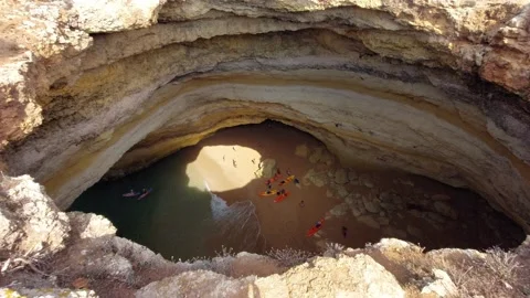 High angle view of people enjoying a sunny day in Benagil cave Stock Footage 218361237