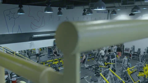 High Angle View of People Exercising in Busy Modern Gym Stock Footage 343098323