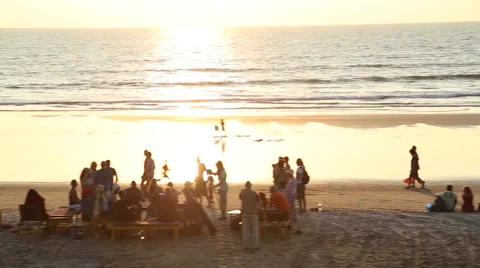 High angle view of people at sandy beach in Goa at sunset. Stock Footage 49666846