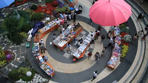 High angle view of people shopping around indoor market Stock Footage 66681364