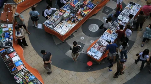 High angle view of people shopping around indoor market Stock Footage 66681404