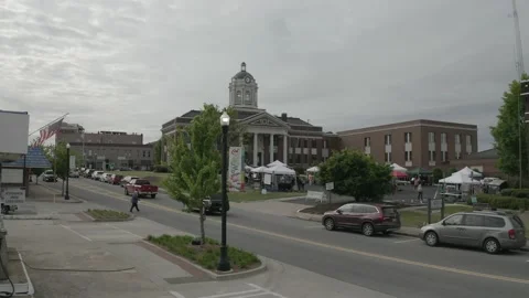 High Angle View Of Person Crossing Street To Visit Local Farmer's Market. 4K Stock Footage 152647554