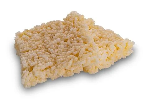 High angle view pile of crispy homemade square rice crackers. Stock Photos