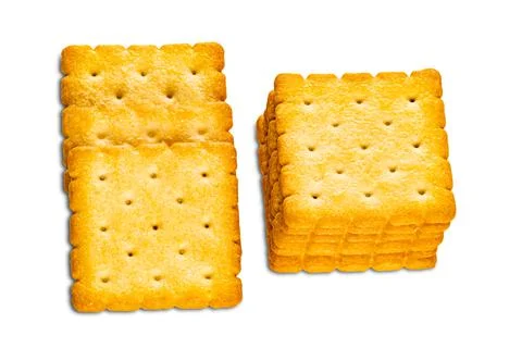 High angle view pile of dry sweet delicious square shape crackers isolated on Stock Photos