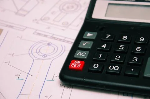 High angle view on the plan of electrical installation with calculator Stock Photos