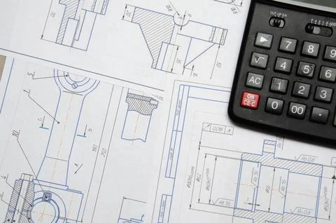 High angle view on the plan of electrical installation with calculator Stock Photos