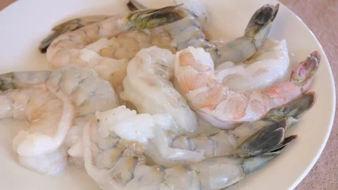 High Angle View of a Platter of Raw Shrimp in 4k Stock Footage 99006171