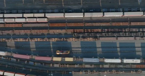High-angle view of rail yard, freight cars and containers. PENROSE, AUCKLAND, NZ Stock Footage 296036862