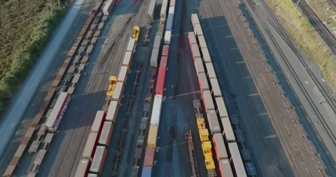 High-angle view of rail yard, freight cars and containers. PENROSE, AUCKLAND, NZ Stock-Footage 296037113