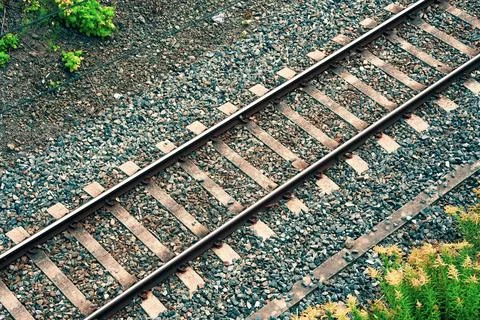 High Angle View of Railroad Tracks with Wooden Sleepers and Gravel Stock Photos