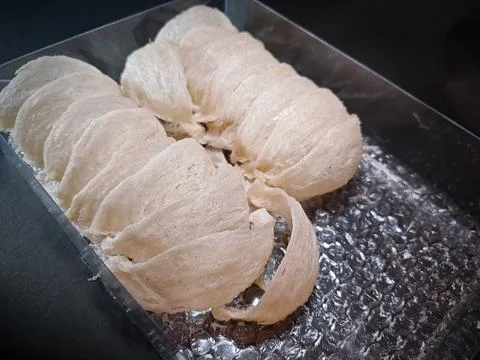 High Angle View of Raw Edible Bird's Nests AAA in a Clear Plastic Container  Stock Photos