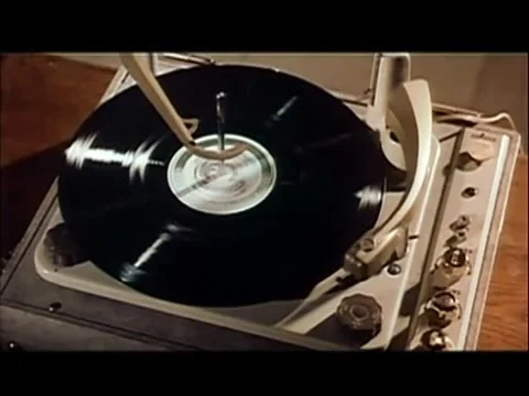 High angle view of record spinning on turntable, 1960s Stock Footage 61444942