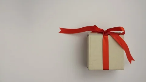 High angle view of a red bow tie paper box  스톡 동영상 127339283