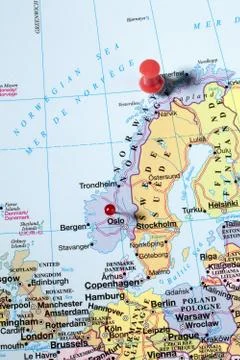 High angle view of red pins on world map Stock Photos