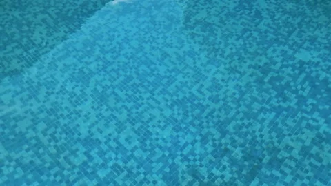 High angle view of rippling clean blue water in an outdoor swimming pool wi.. Stock Footage 336531378