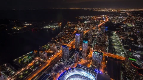 High angle view of Rogers Centre and Toronto waterfront area time lapse at night Stockbeeldmateriaal 119135246