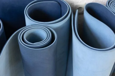 High angle view of   rolled blue color yoga mat texture background Stock Photos