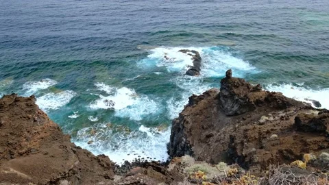 High angle view of the rough Atlantic Ocean and a volcanic cliff coast Stock Footage 175306305