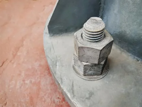 High Angle View of Round Machine Base Fastened with Double Nuts Stock-Fotos