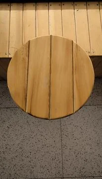 High angle view of a round wooden stool. Foto stock