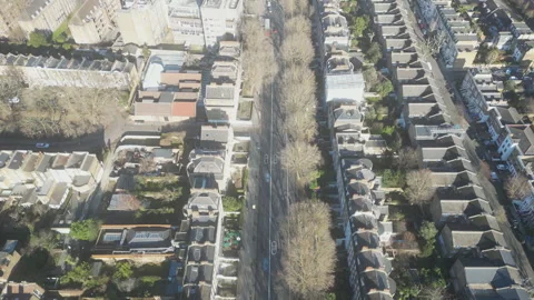 A high angle view of rows of English residential houses along the road. Stock Footage 300855623
