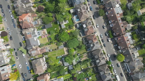 A high angle view of rows of houses with beautiful gardens. Stock Footage 304261866