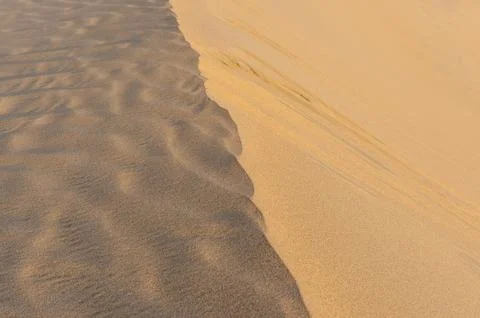 High Angle View of Sand Dune Texture with Sharp Light and Shadow Contrast. Stock Photos