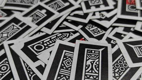 High Angle View of Scattered Black and White Geometric Pattern Cards Stockfoto's