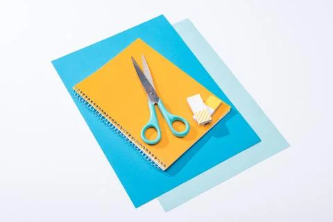 High angle view scissors notebook Stock Photos