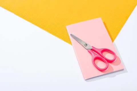 High angle view scissors notebook Stock Photos