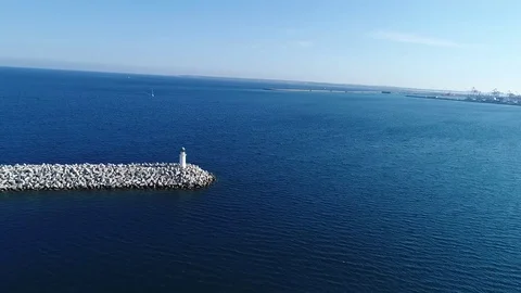 High angle view of the sea tracking over lighthouse Stock Footage 78561970