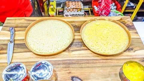 High angle view of the serving process of sweet pan-fried pastry, Martabak Keju Stock Photos