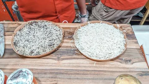 High angle view of the serving process of sweet pan-fried pastry, Martabak Keju Stock Photos