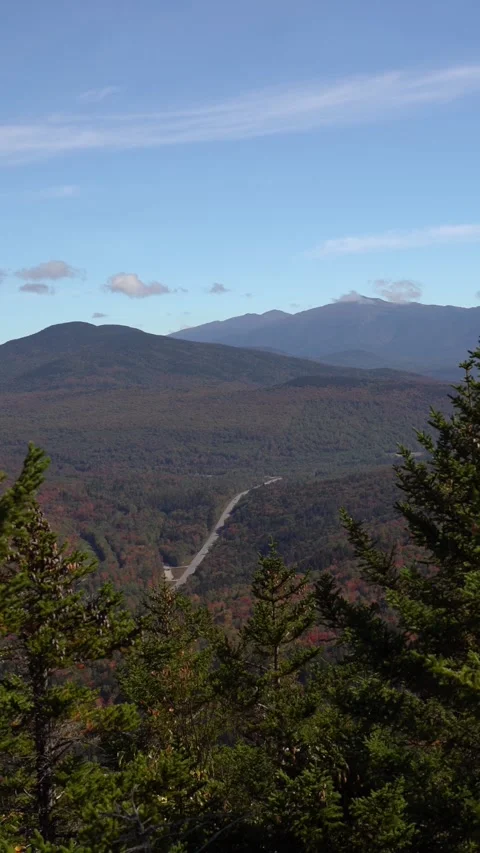 A high angle view shows autumn valley in White Mountain National Forest, NH Stock Footage 321505136
