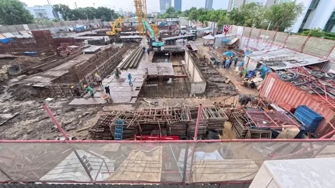 High angle view shows Workers constructing Stock Footage 321131137